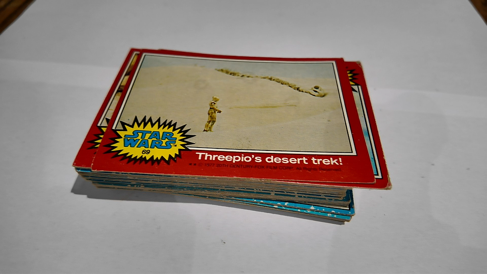 Lot 247: A Collection of 1977 Star Wars Series 1 and Series 2 Trading Cards by Topps