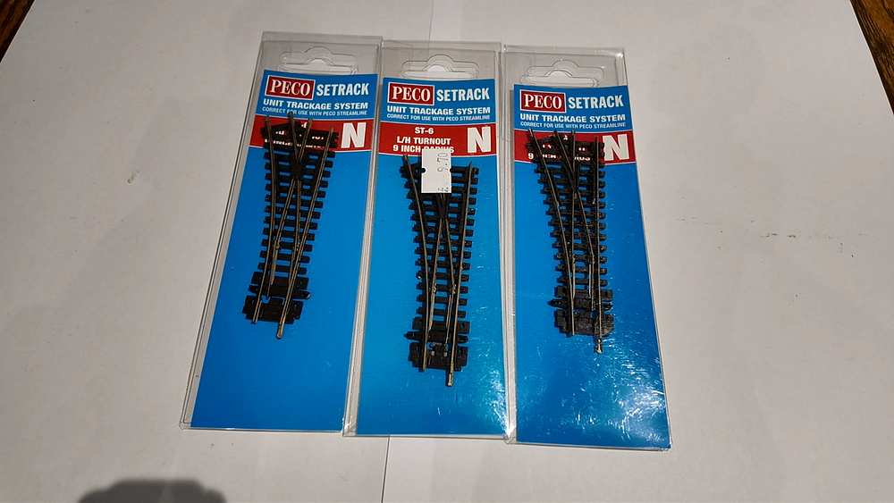 Lot 212: Three Peco Setrack N Gauge ST-6 Left Hand Turnouts