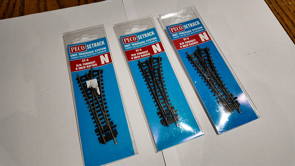 Lot 223: Three PECO Setrack N Gauge ST-5 Right Hand Turnouts in Original Packaging