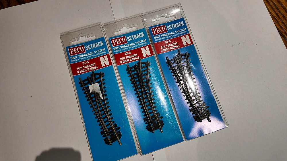 Lot 225: Three Peco Setrack N Gauge ST-5 Right Hand Turnouts in Original Packaging