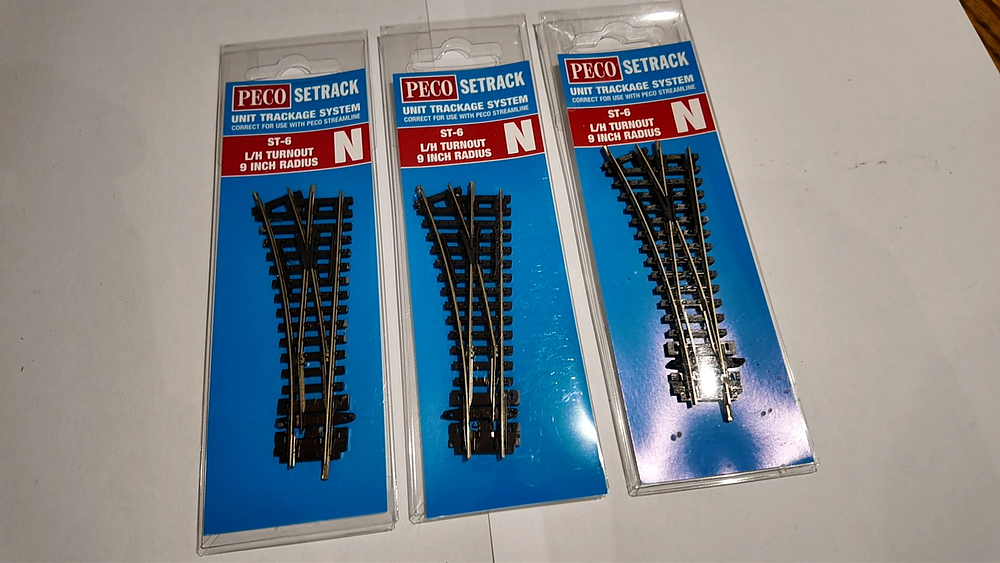 Lot 227: Three Factory Sealed PECO Setrack N Gauge ST-6 Left Hand Turnouts