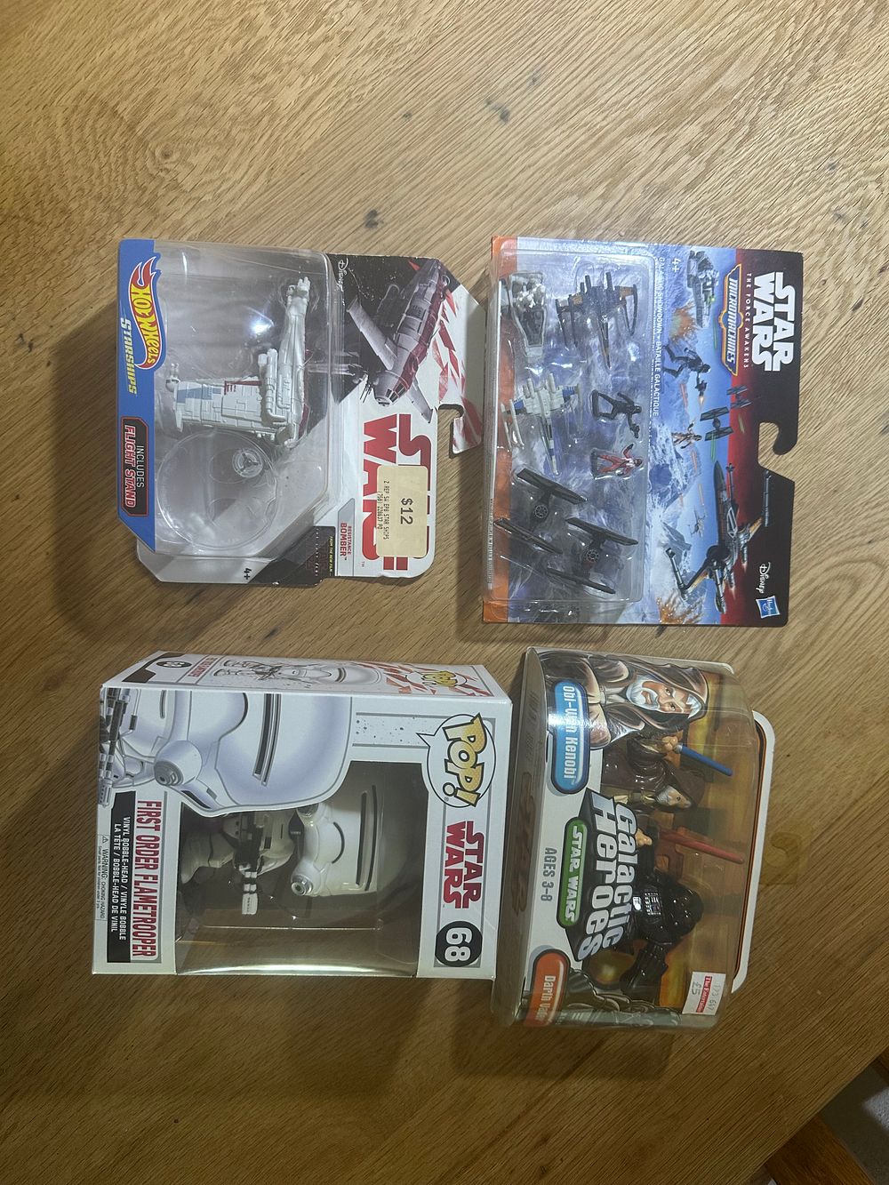 Lot 299: A Collection of Star Wars Collectible Figures and Vehicles
