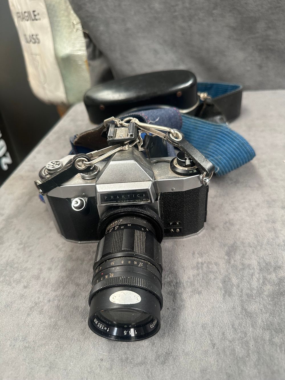 Lot 380: Praktica Super TL 35mm SLR Film Camera with 135mm f/3.5 Lens and Case