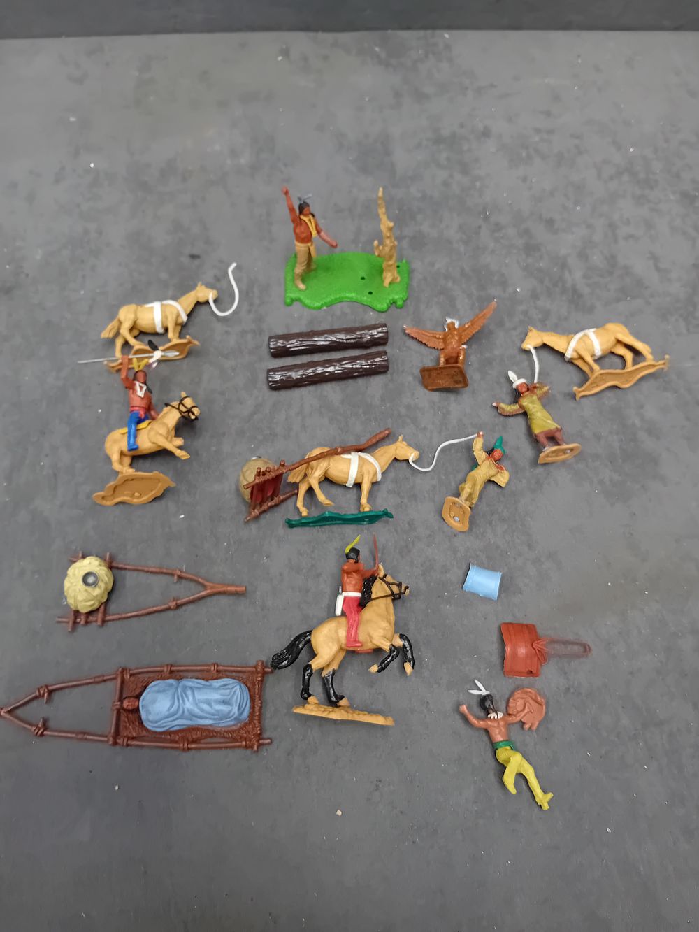 Lot 322: An Assortment of Vintage Plastic Wild West Native American Figures and Accessories
