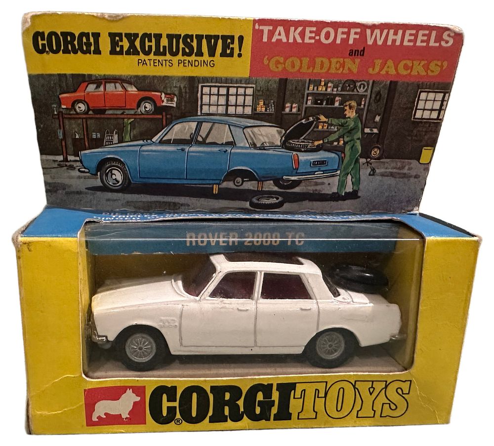 Lot 129: Corgi Toys 275 Rover 2000 TC Die-Cast Model with Take-Off Wheels and Golden Jacks