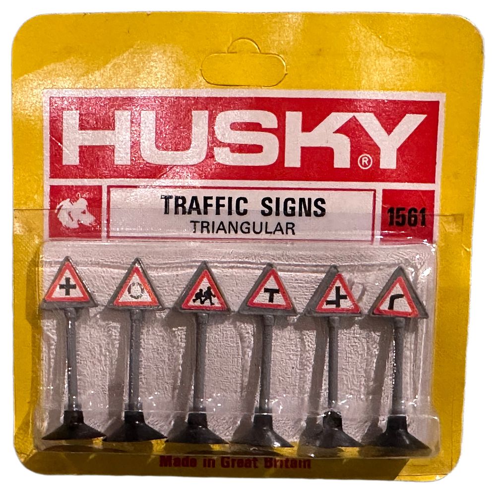 Lot 146: A Set of Husky Models No. 1561 Triangular Die-Cast Traffic Signs in Original Blister Pack