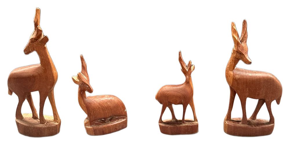Lot 616: A Group of Four Hand Carved Kenyan Hardwood Antelope Figurines