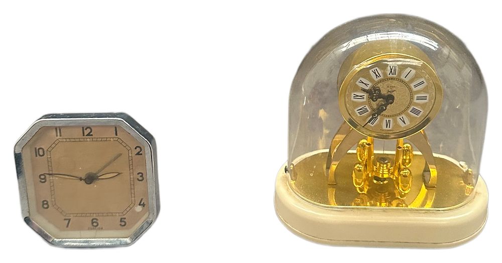 Lot 625: Two Small Desktop Clocks Comprising a Miniature Anniversary Style Clock and an Octagonal Travel Clock