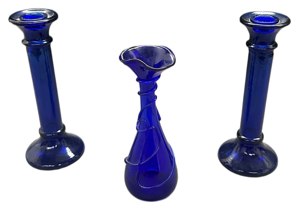 Lot 656: Three Cobalt Blue Glass Decorative Items Including a Pair of Pillar Candlesticks and a Miniature Ewer