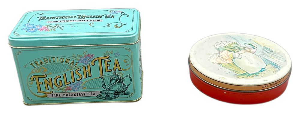 Lot 628: Two Decorative Metal Tea Tins and Contents