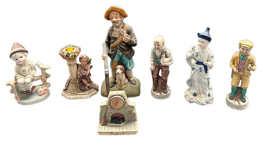 Lot 457: A Collection of Decorative Ceramic and Bisque Porcelain Figurines and Miniature Souvenirs