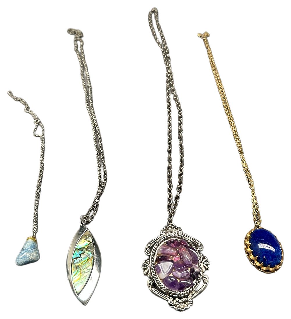 Lot 642: A Group of Four Assorted Fashion and Costume Necklaces Featuring Lapis Lazuli, Amethyst, and Abalone Shell