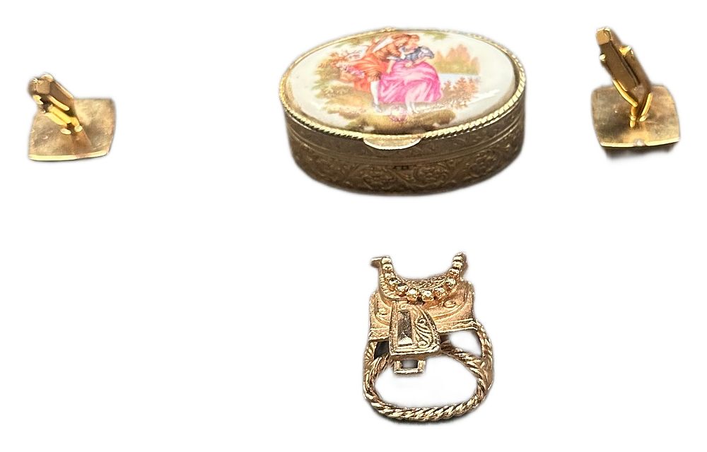Lot 646: A Collection of Gold-Tone Accessories Including an Oval Pillbox and Western Saddle Charm
