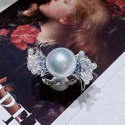 Pearl Ring. Pearl ring Pearl diameter 11-10MM round with slight flaws, 925 sterling silver