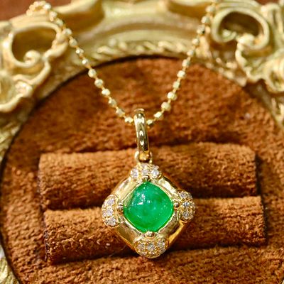 18k Emerald Pendant and Earrings. Emerald earrings 18K gold weighing 1.18g, main stone 1.0ct