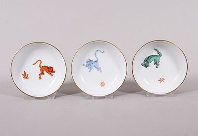Three small Meissen bowls with tiger motifs, 2004 to 2006 Porcelain, polychrome painted, with 