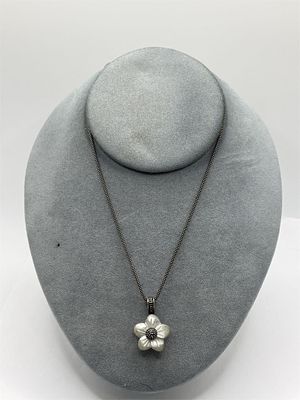 Sterling Necklace with Flower Pendant. 18 inches6.3 gramsChain marked "Italy", Pendant marked "Thai"