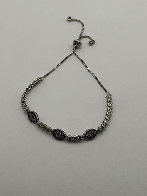 Sterling Bracelet with Blue and Clear Stones. 10 inches (adjustable)7.7 grams