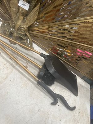 A Cast Brass Peacock Fan Fireplace Screen and a Pair of Neoclassical Style Andirons. This lot 