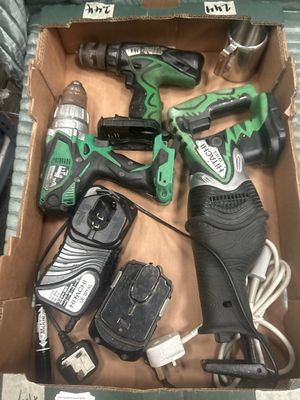 An Assortment of Hitachi Cordless Power Tools and Accessories. A collection of used Hitachi 