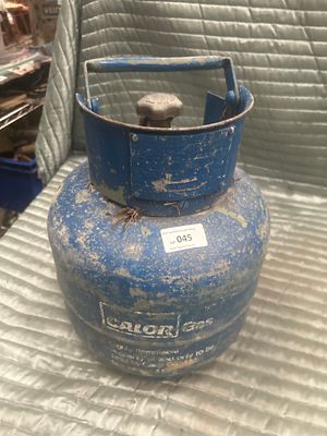 A Vintage Calor Gas 4.5kg Butane Cylinder. A vintage blue metal gas cylinder manufactured by 