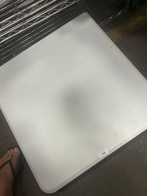 A Square Moulded White Plastic Folding Utility Table with Metal Frame. A square folding utility 