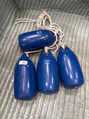 A set of four Anchor Marine single eyelet boat fenders. A set of four matching marine boat 