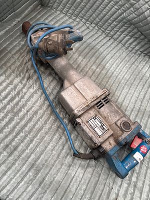 Kango Type 900 Electric Demolition Hammer. A Kango Type 900 electric demolition hammer 