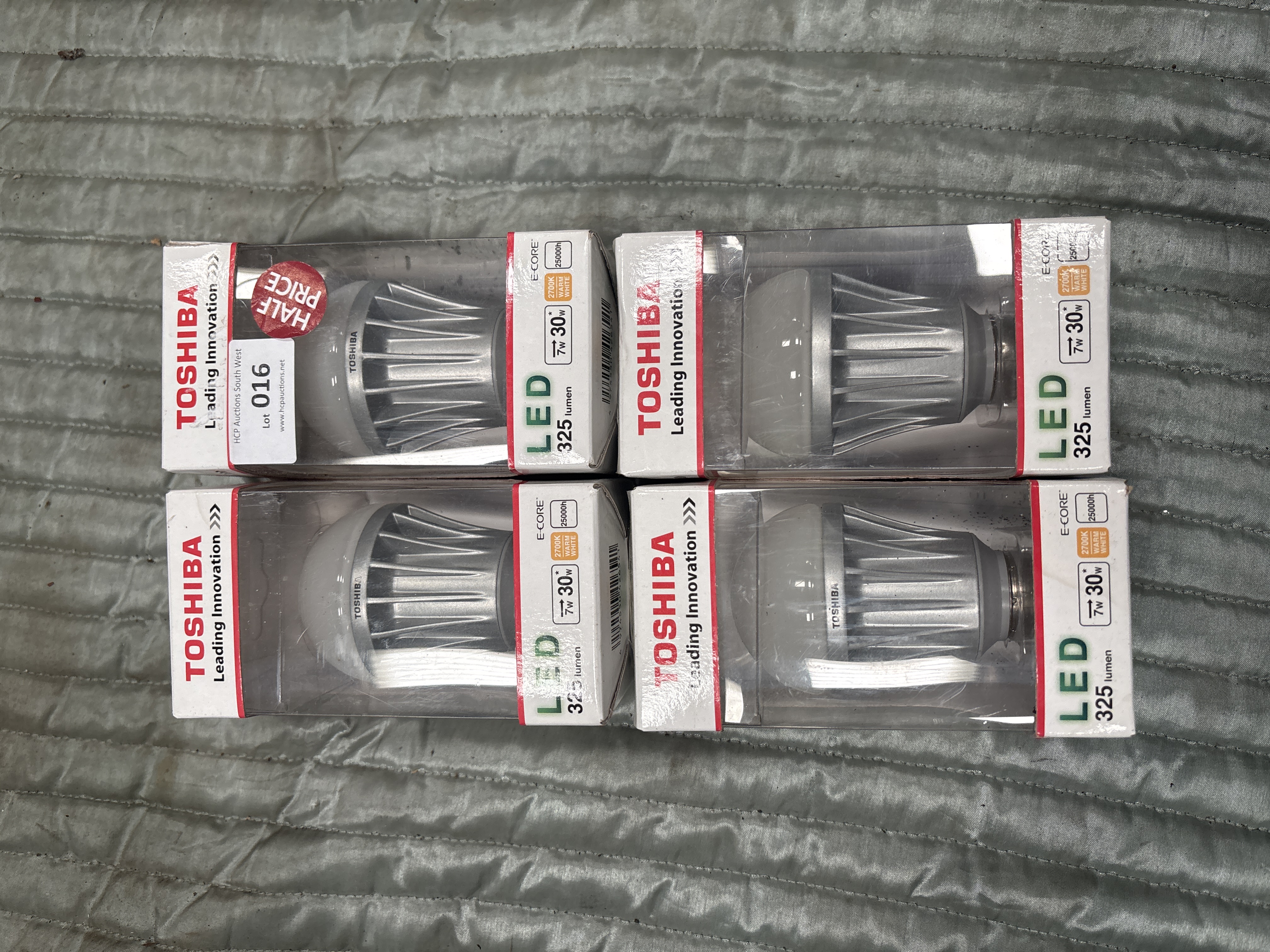 A Group of Four Toshiba E-CORE LED Light Bulbs