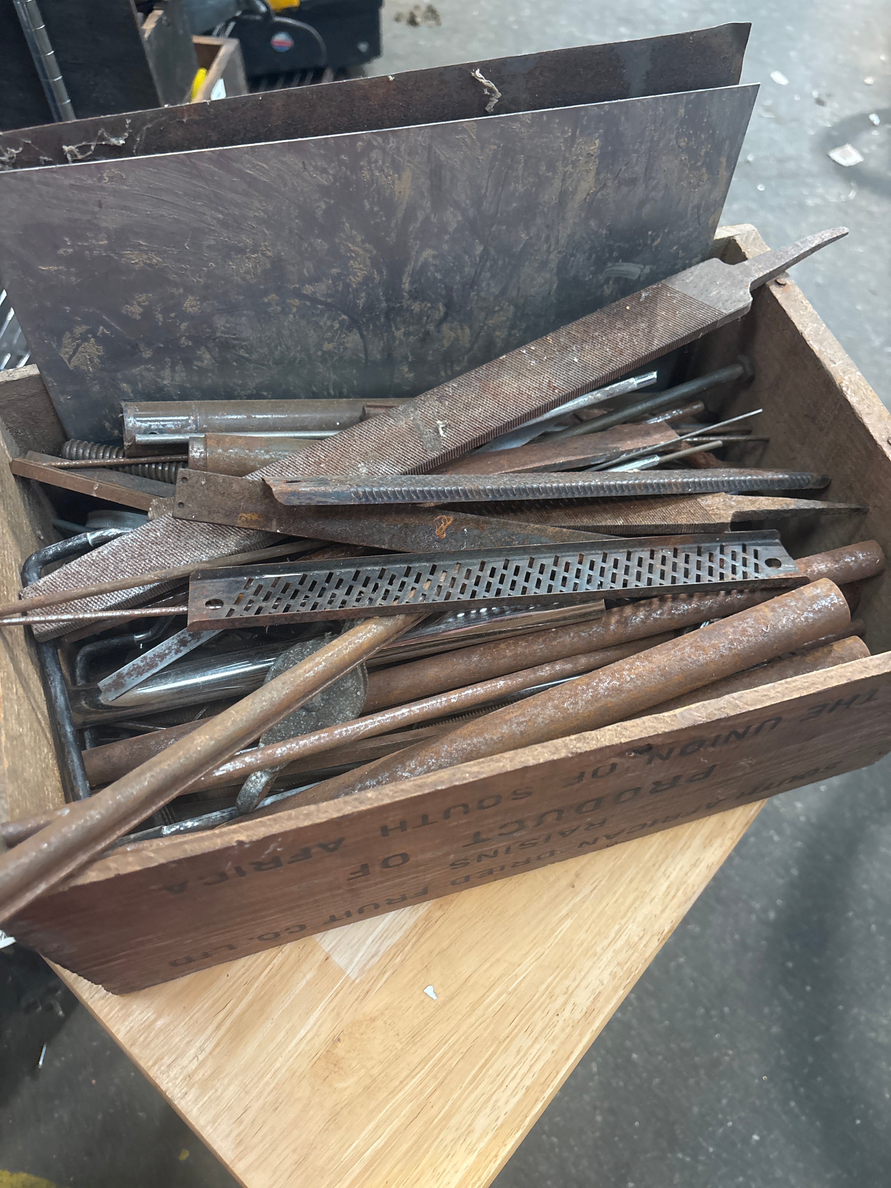 A Vintage Steel File and Rasp Collection in a Wooden Crate