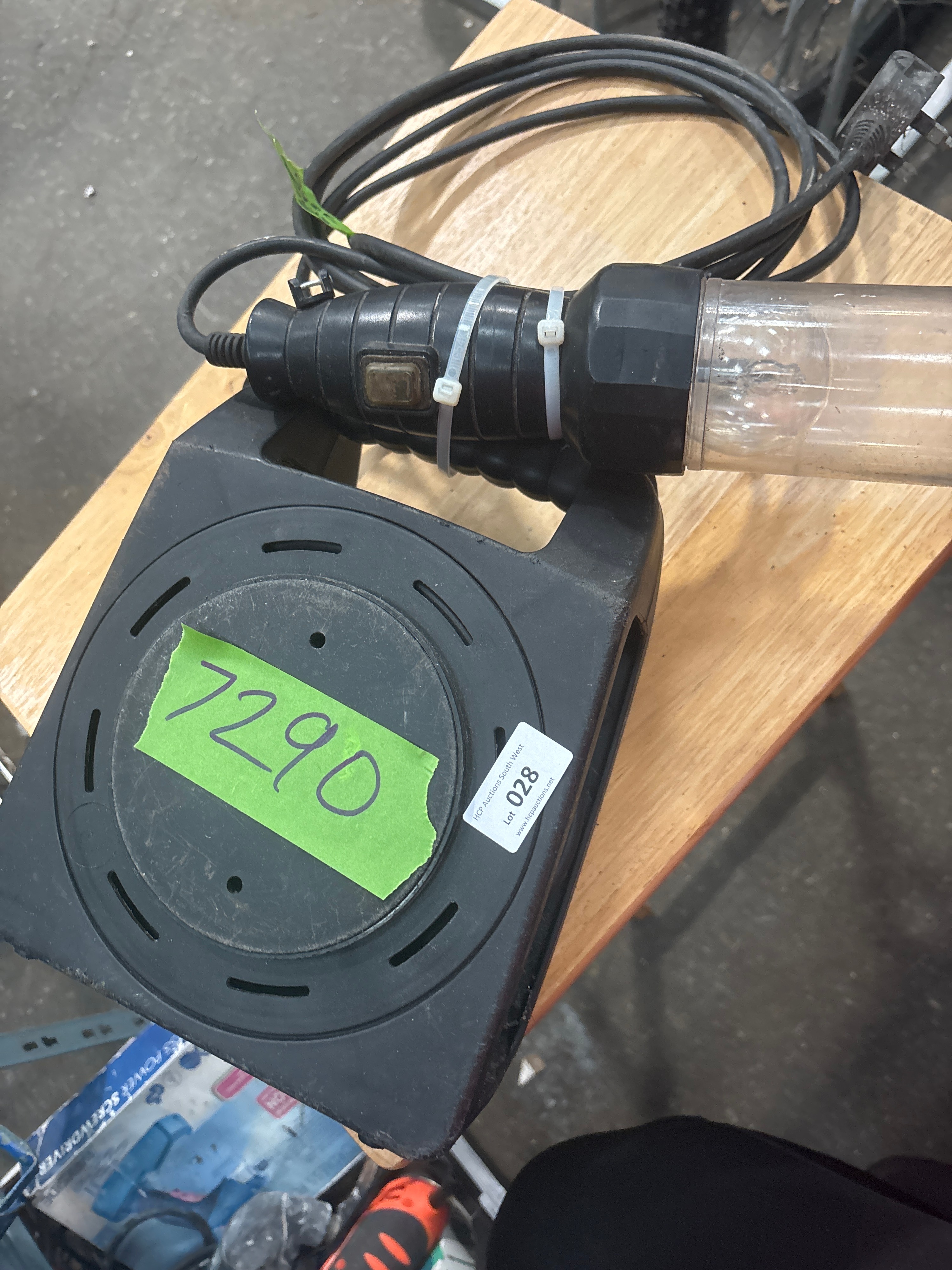 A Vintage Plastic and Rubber Retractable Handheld Inspection Lamp