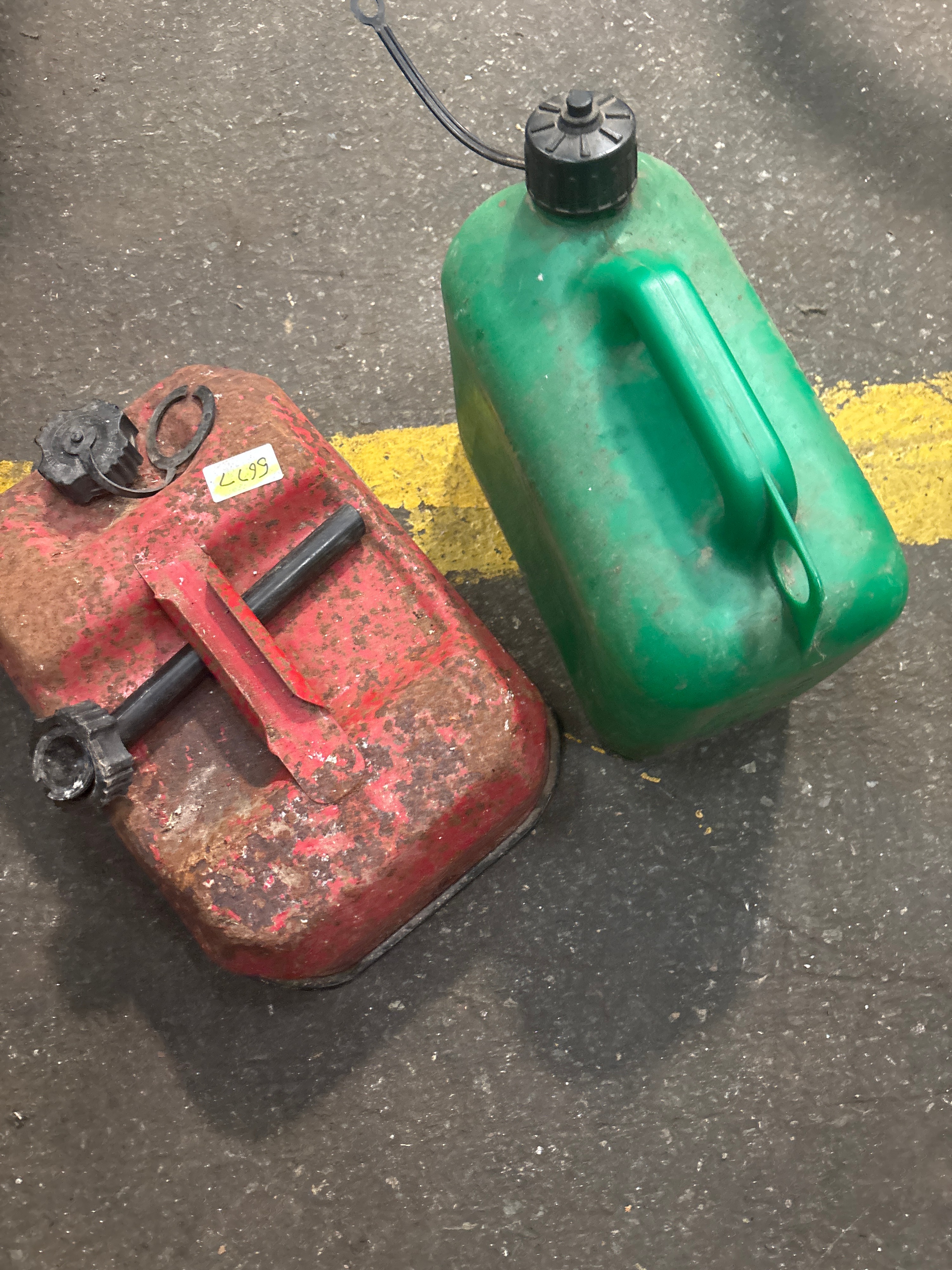Two Vintage Plastic and Metal Fuel Cans