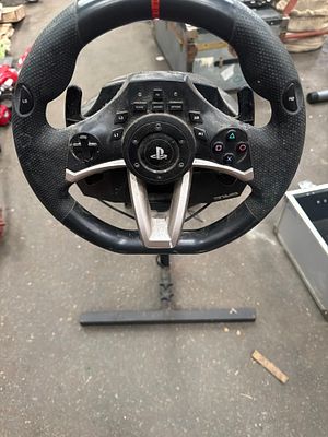 A Hori Racing Wheel Apex steering wheel and pedal set with custom stand. A Hori Racing Wheel 