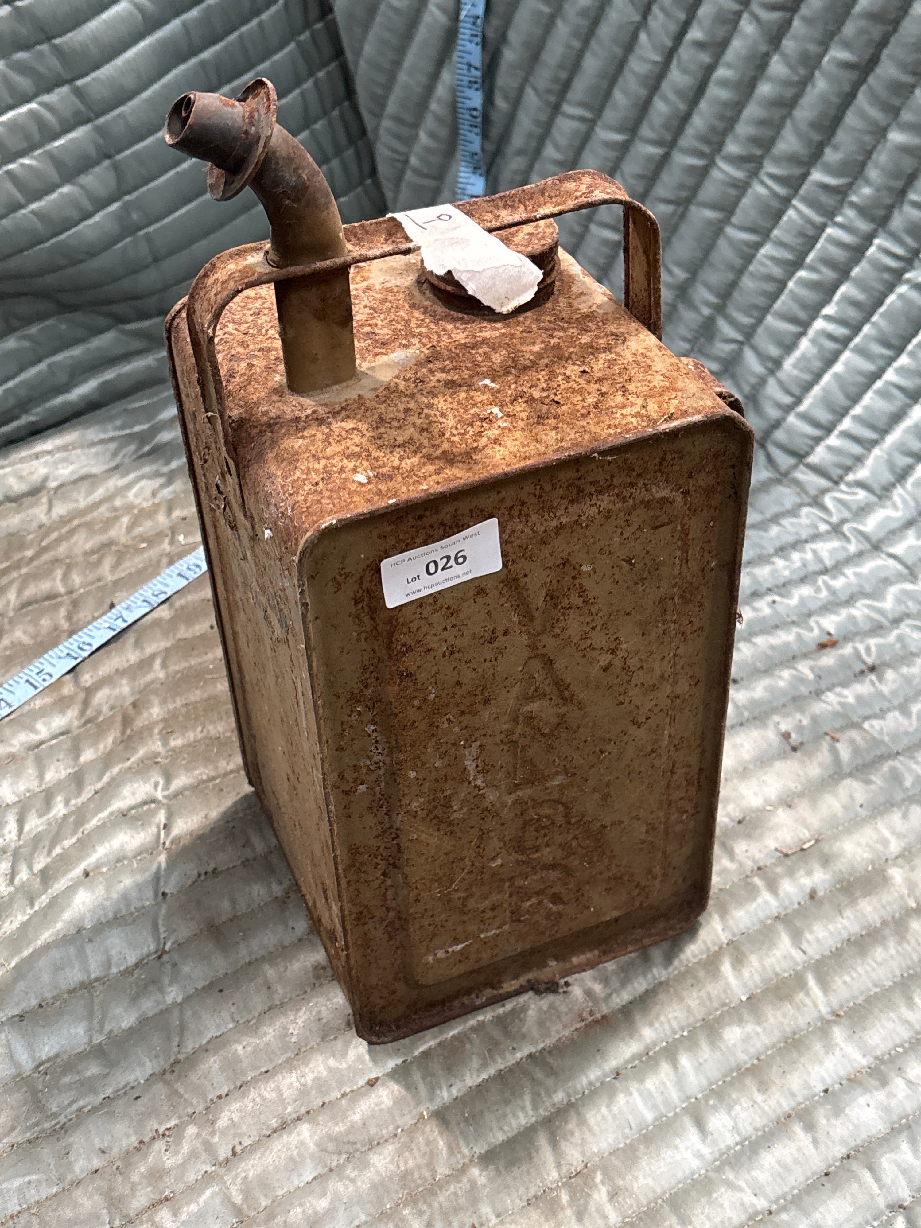 A Vintage Steel Petrol Can with Spout and Screw Cap