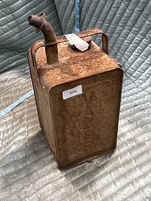 A Vintage Steel Petrol Can with Spout and Screw Cap. A vintage steel fuel can of rectangular 