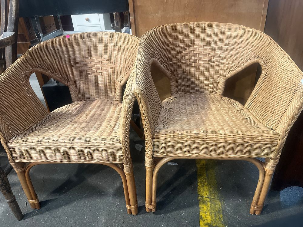 Lot 821: A Pair of Woven Wicker and Rattan Tub Armchairs