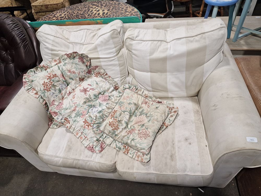 Lot 825: A Striped Fabric Two-Seater Sofa with Floral Scatter Cushions