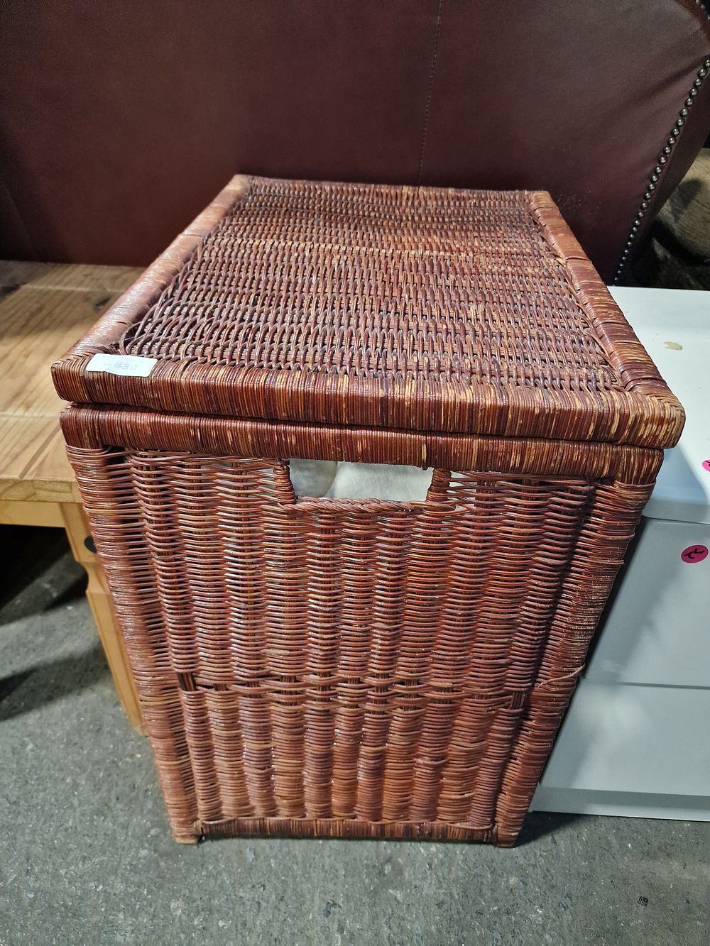 Lot 830: A Woven Rattan Storage Trunk and Wool Trade Blanket