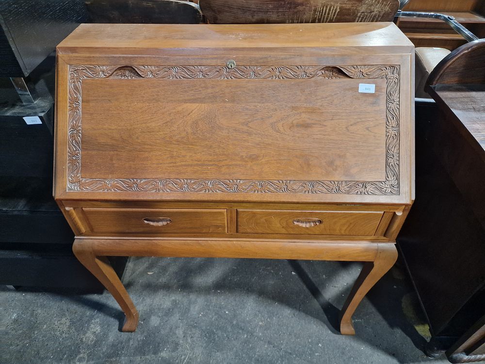Lot 841: Mid-20th Century Carved Teak Secretary Bureau