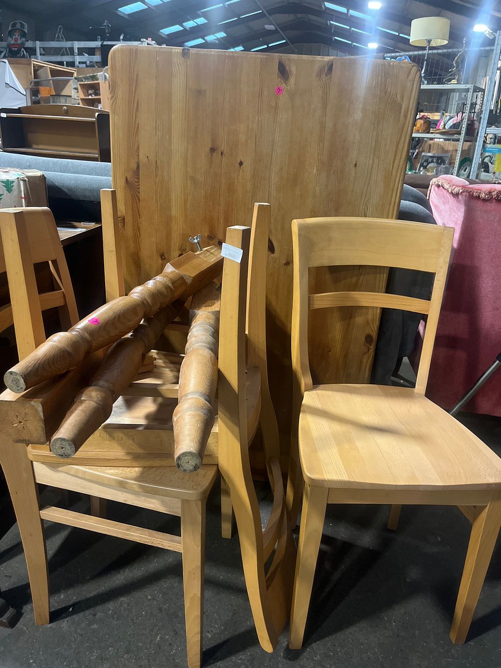 Lot 860: A Pine Farmhouse Dining Table and a Set of Beech Chairs