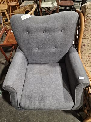 Mid-Century Wingback Armchair in Grey Textured Fabric. A mid-century wingback armchair 
