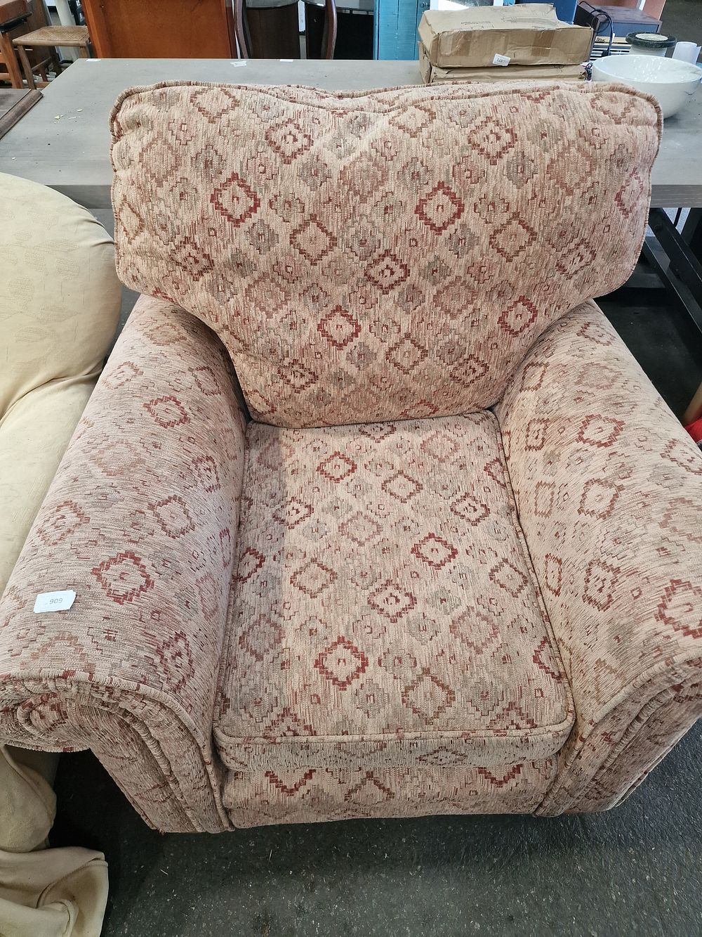 Lot 909: A Patterned Chenille Upholstered Club Chair
