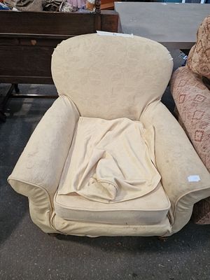 A Vintage Upholstered Damask Club Armchair. A vintage upholstered club armchair of deep 