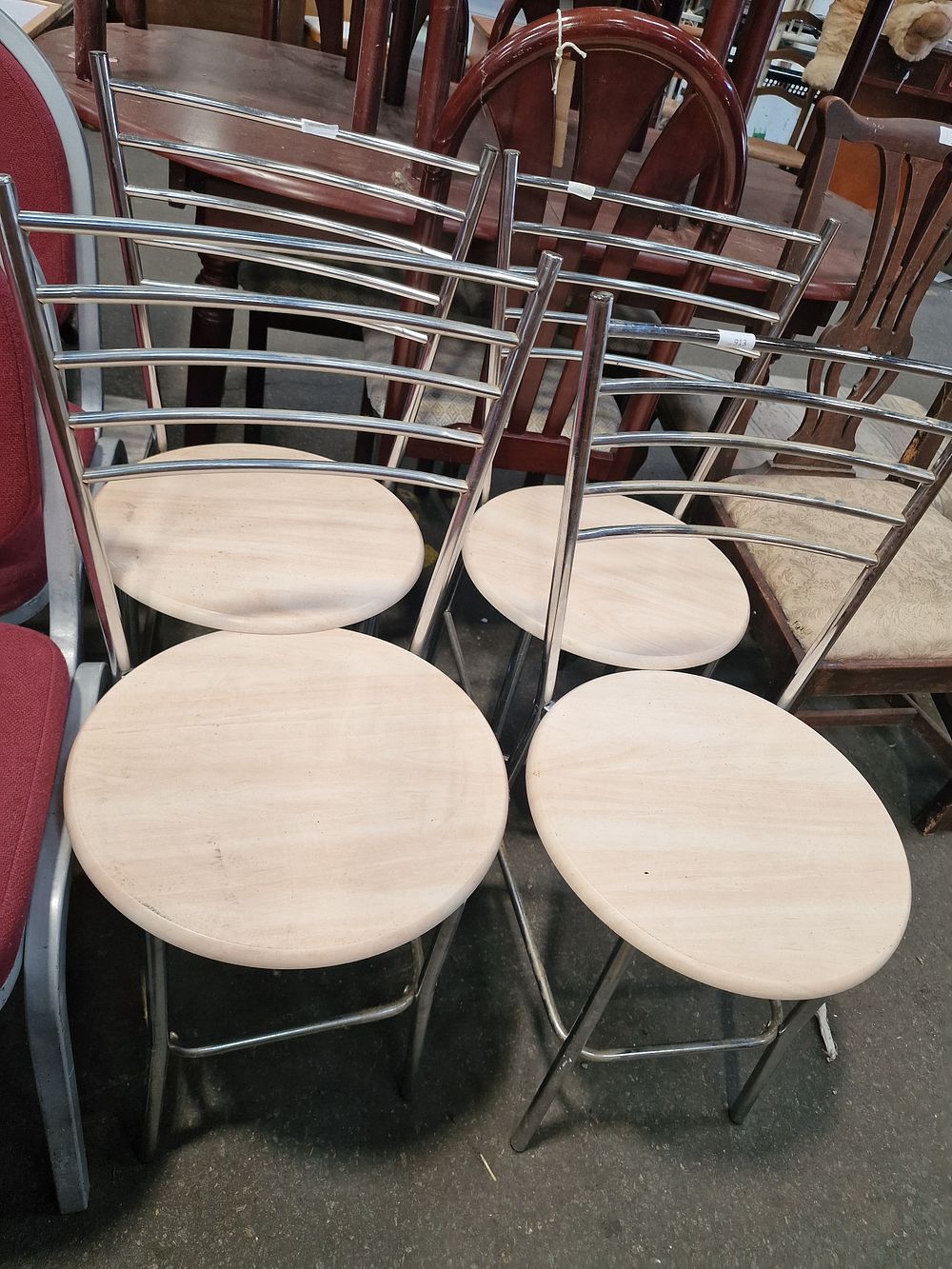 Lot 913: A Set of Four Chrome and Plywood Dining Chairs