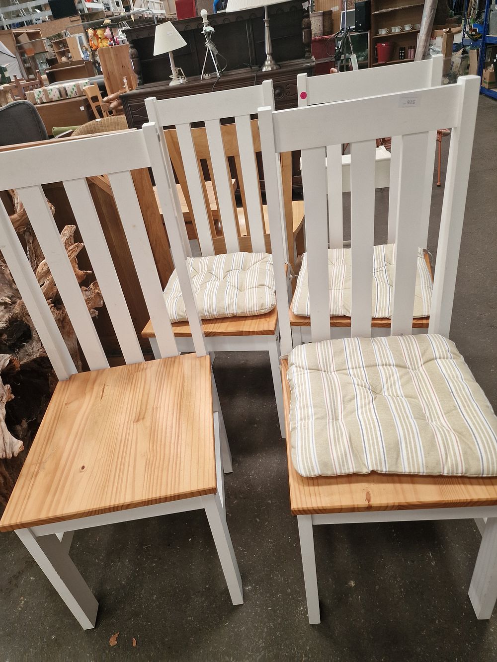 Lot 925: A Set of Four Painted Pine Slat-Back Dining Chairs