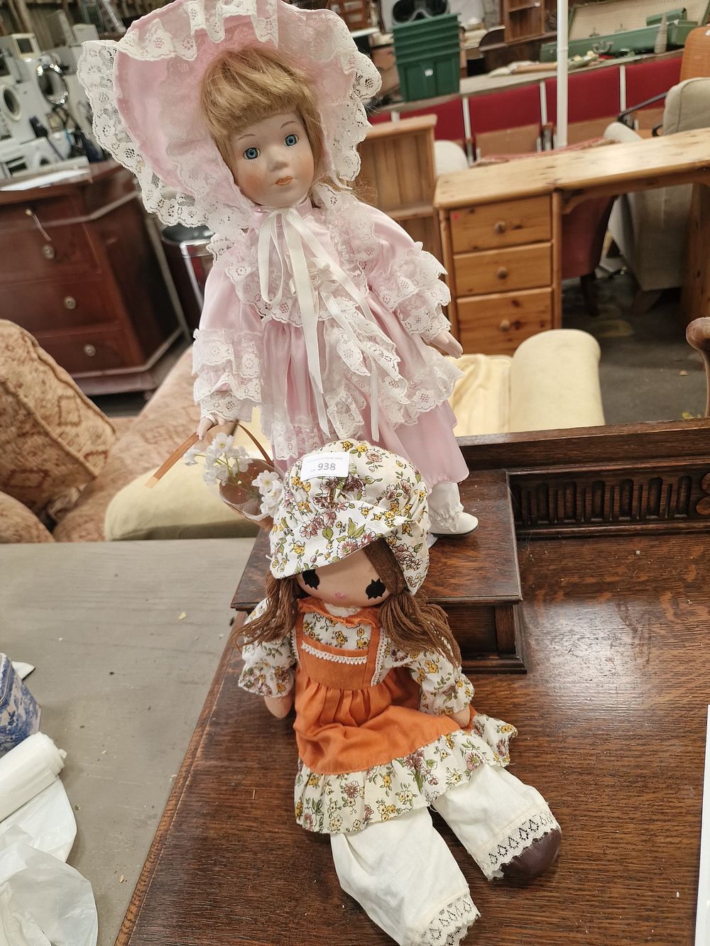 Lot 938: Two Porcelain and Cloth Decorative Dolls