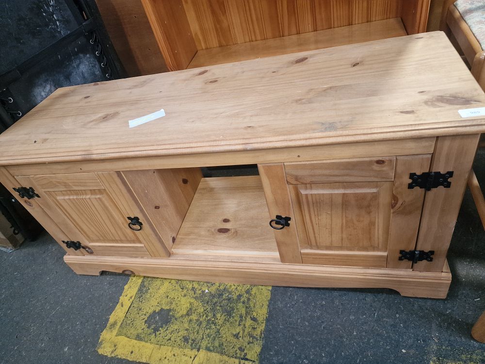 Lot 989: A Pine Two Door Media Cabinet in the Corona Fashion