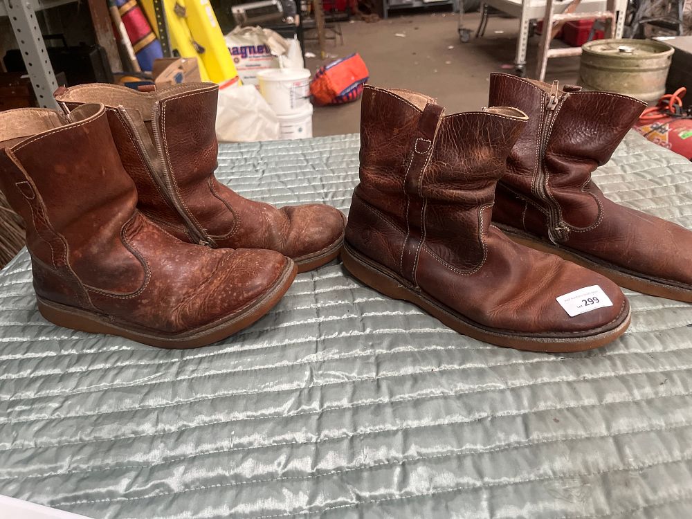 Lot 299: Two Pairs of Brown Leather Pull-On Boots