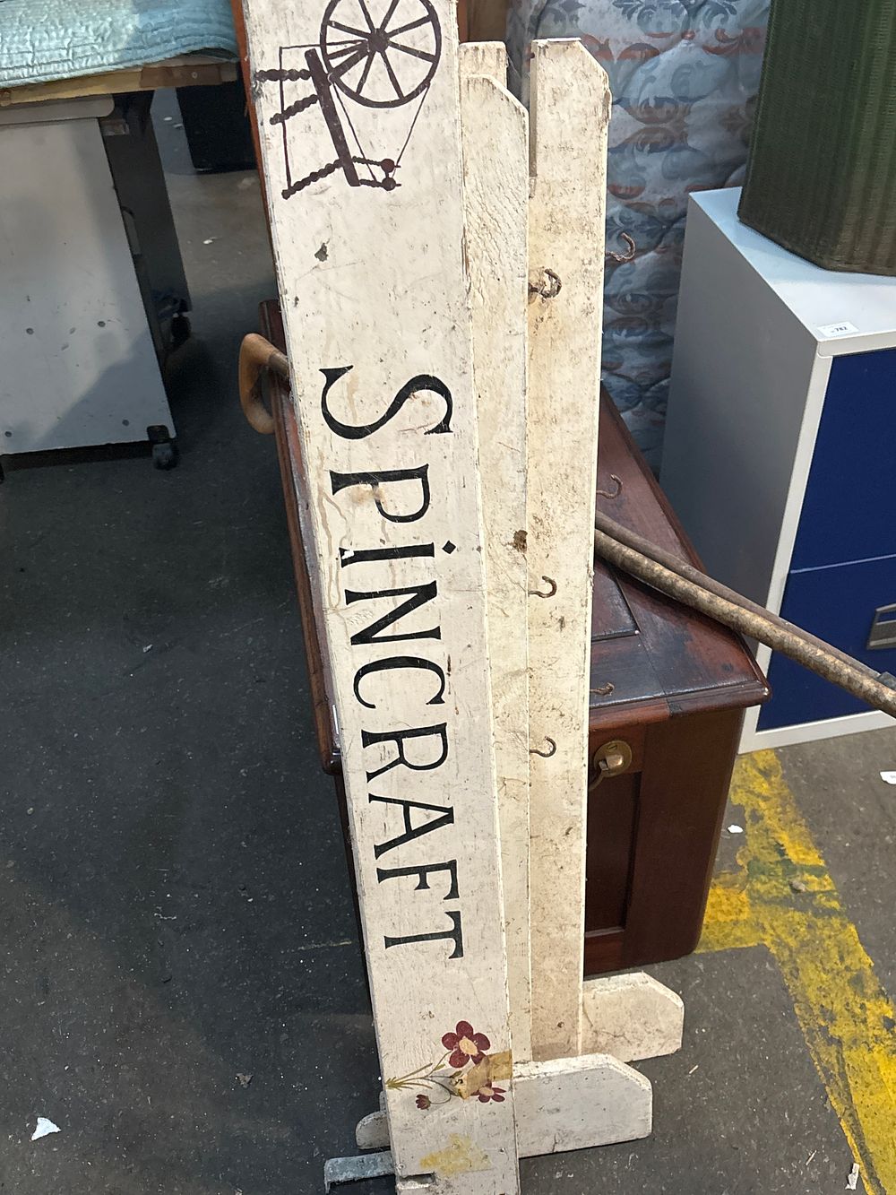 Lot 780: Two Painted Wooden Spincraft Display Signs and Two Rustic Walking Sticks