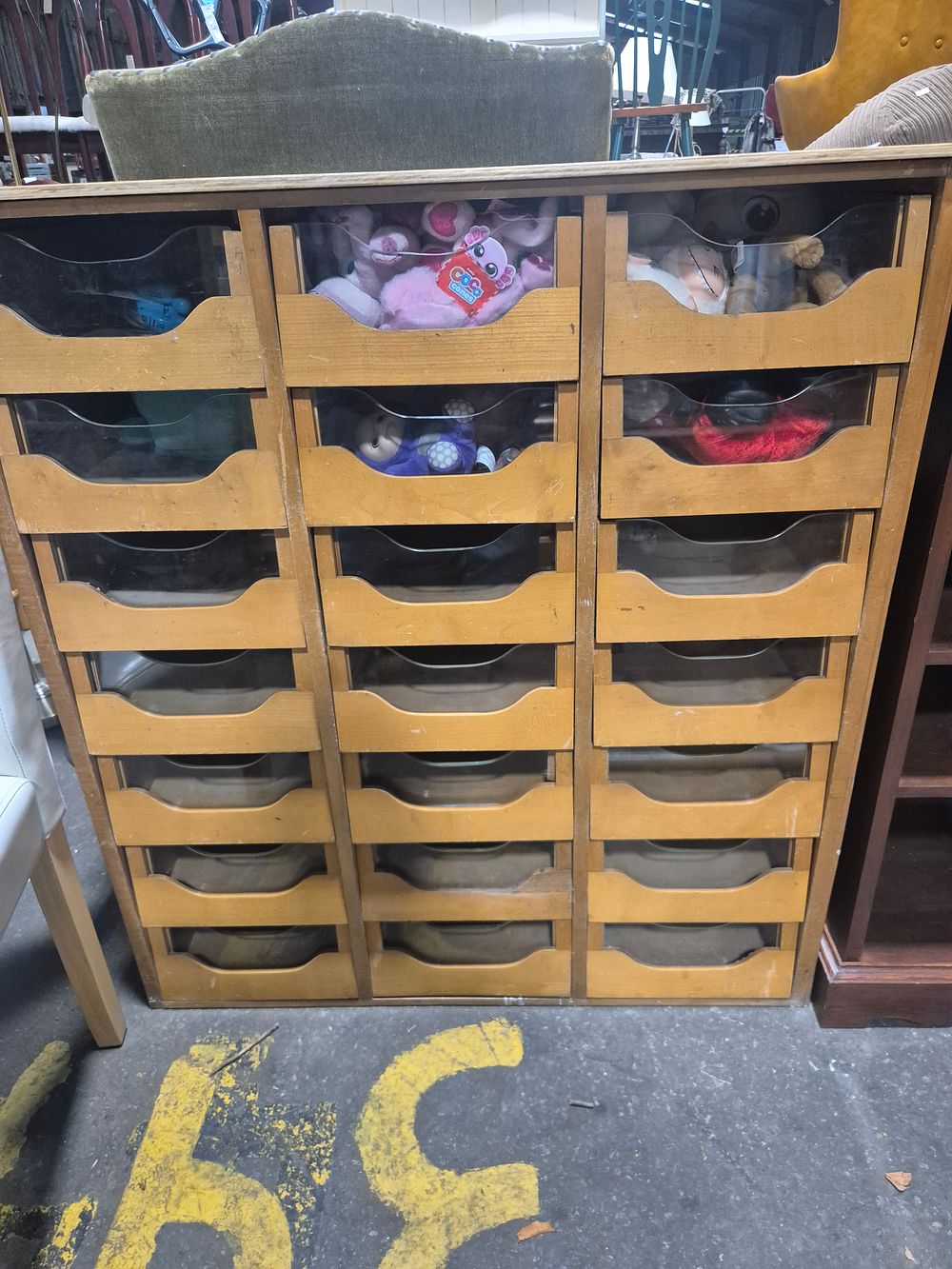 Lot 937: A Mid-Century Light Oak Haberdashery Shop Display Cabinet